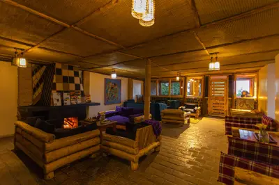 Main lounge with log fire