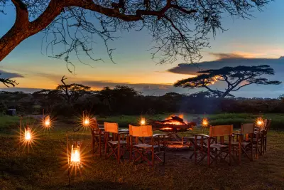 Lantern-lit campfire at dusk