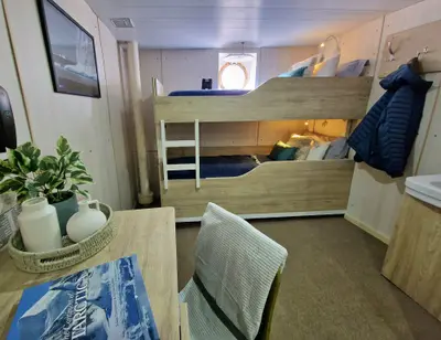 Standard Twin cabin — upper/lower bunks (shared bathroom)