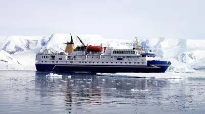 Ocean Nova at anchor in calm water