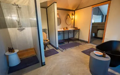 Family tent en-suite with freestanding tub