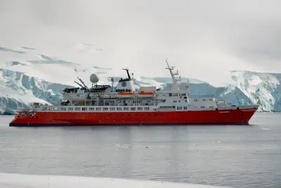The same ship as G Expedition (red livery) in the Gerlache Strait, 2025