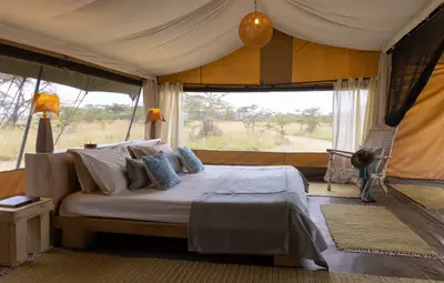 Double tent — bed facing the open plains