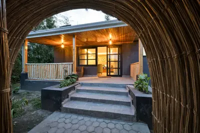 Woven-bamboo arch to a cottage