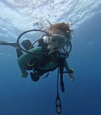 Diver hovering mid-water