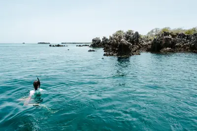 Snorkelling around a coral islet