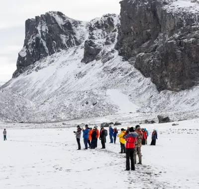 Expedition group on a snowy landing