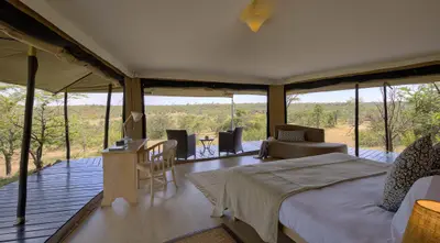 Double tent interior looking out to the hillside