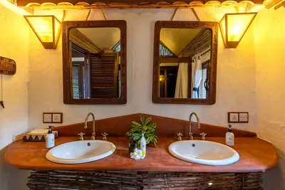 Bahari bungalow bathroom — twin basins