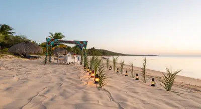 Private dinner set on the sand
