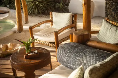 Lounge chairs under the thatch