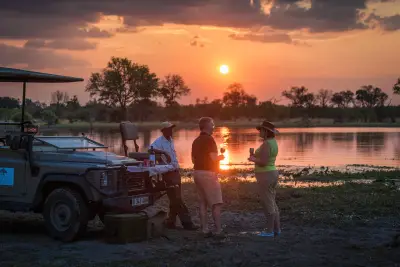 Sundowners as the sun sets over the river