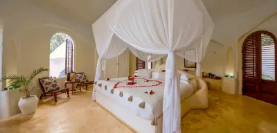 Garden View Villa — canopy bed under the dome