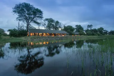 Camp reflected in the Gomoti channel