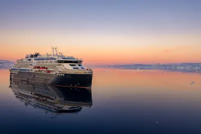 MS Roald Amundsen at sunset in Antarctica