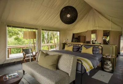 Tent sitting area at the foot of the bed