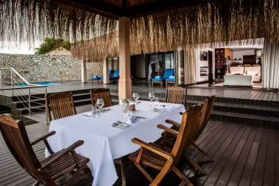 Deluxe Sea View Pool Villa veranda set for dinner
