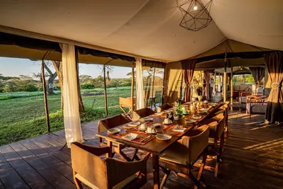 Dining tent set for lunch