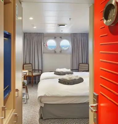 Porthole cabin — porthole windows, beds as king or twin