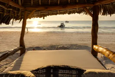 Beach bed at sunrise