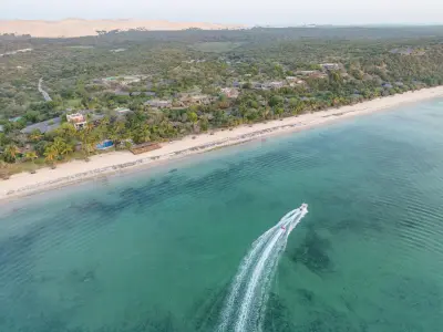 Aerial of the resort, dunes and lagoon