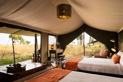 Tent bedroom opening onto the grasslands