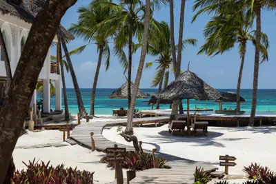 Resort boardwalk and beach umbrellas