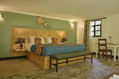 Deluxe cottage bedroom with stone floors