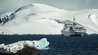 Plancius with a tabular iceberg