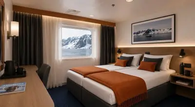 Premium Suite — double bed, large windows